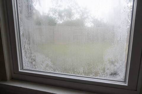 Condensation trapped between the panes of a failed window unit